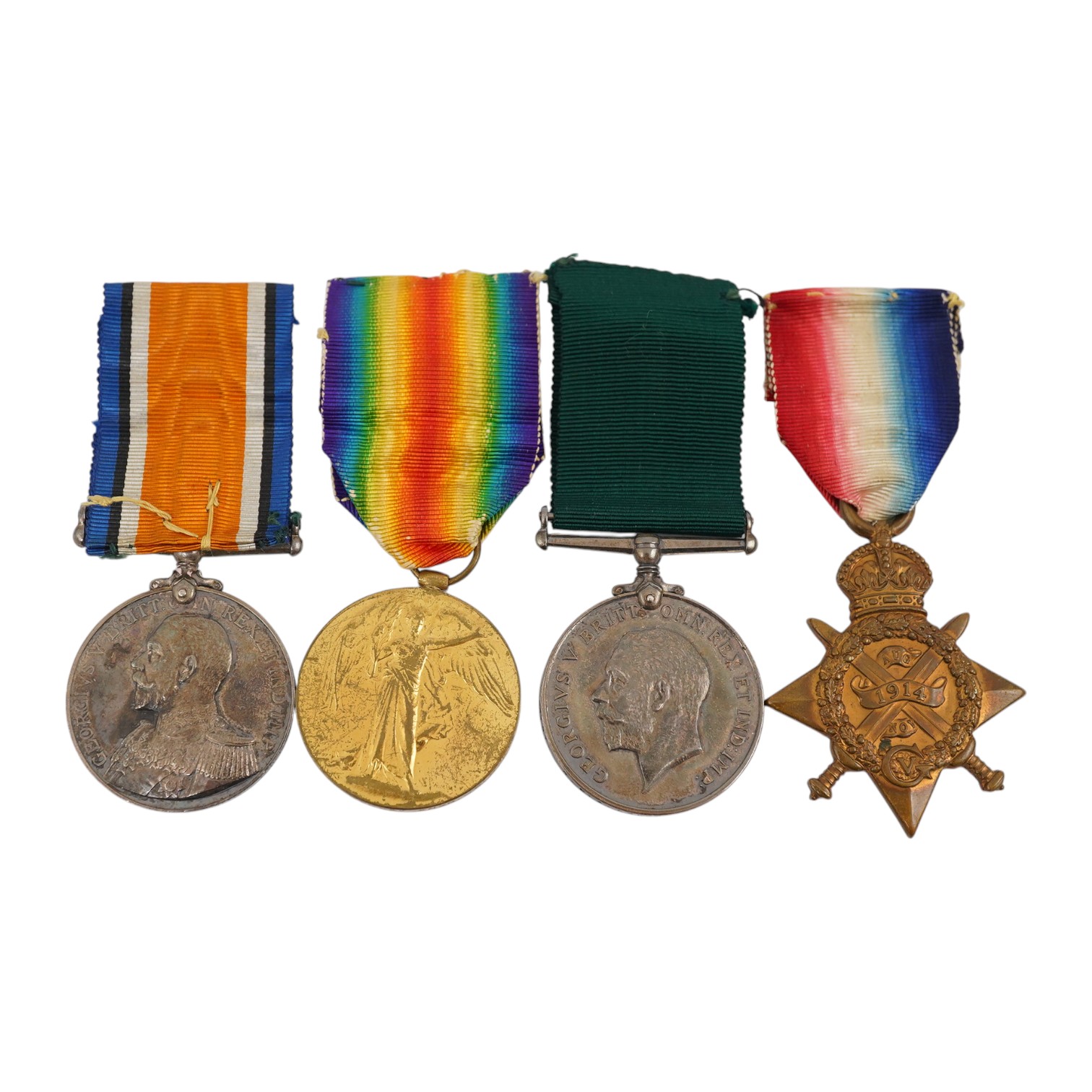 A First World War medal trio and Naval Reserve Long Service medal awarded to R.E.A. Lawrence ENGN RNR. Condition - fair.